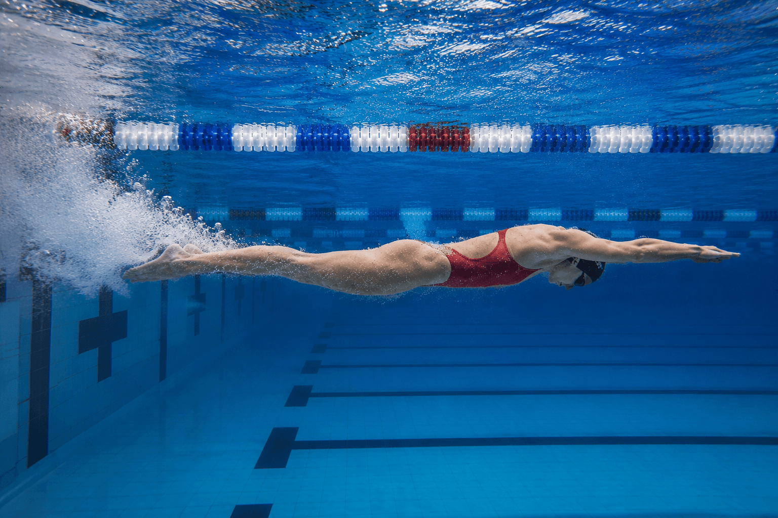 SwimmerBot filming a swimmer underwater